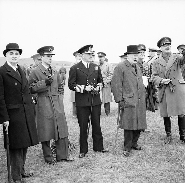 Lord Cherwell, scientific advisor to the Prime Minister, Air Chief Marshal Sir Charles Portal, Admiral of the Fleet Sir Dudley Pound, and Winston Chur