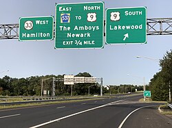 Route 33 westbound at the U.S. Route 9 interchange 2020-09-15 09 18 21 View west along New Jersey State Route 33 (Freehold Bypass) at the exit for U.S. Route 9 SOUTH (Lakewood) in Freehold Township, Monmouth County, New Jersey.jpg
