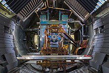 The Advanced Electric Propulsion System qualification thruster inside one of the vacuum chambers at NASA Glenn's Electric Propulsion and Power Laboratory. AEPS at NASA Glenn.jpg