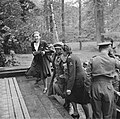 Princess Juliana, Queen Wilhelmina and Rie Stokvis climb the front steps upon their arrival