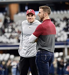 O'Connell on the sidelines with Alex Smith prior to a game against the Dallas Cowboys Alex Smith 2019.jpg