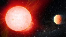 A gas giant exoplanet [right] with the density of a marshmallow has been detected in orbit around a cool red dwarf star [left] by the NASA-funded NEID radial-velocity instrument on the 3.5-meter WIYN Telescope at Kitt Peak National Observatory. Artist impression of ultra fluffy gas giant planet orbiting a red dwarf star.jpg