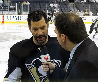 Bill Guerin of the Pittsburgh Penguins is interviewed by HNIC reporter Elliotte Friedman before a May 8, 2010 playoff game against the Montreal Canadiens at Mellon Arena.