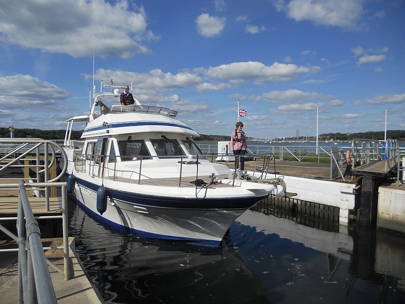 File:Boat entering Island Harbour marina, Isle of Wight, England.jpg