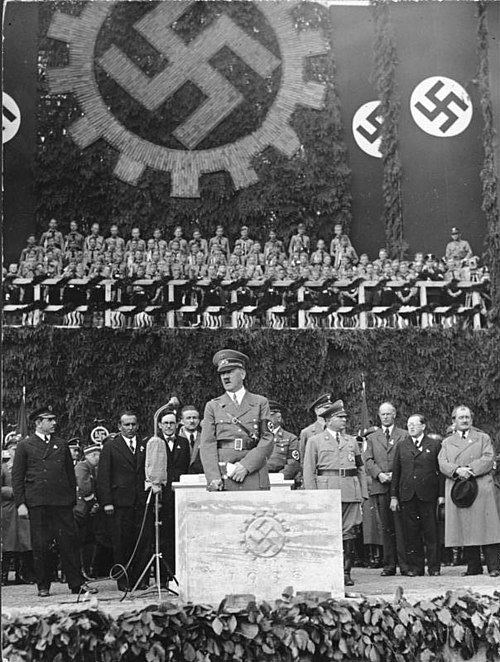 May 6, 1938: Adolf Hitler lays the foundation stone of the Volkswagen factory. On far right: Ferdinand Porsche