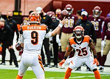 Burrow delivers a pass to Bengals wide receiver Giovani Bernard in November 2020. Burrow and Bernard.jpg
