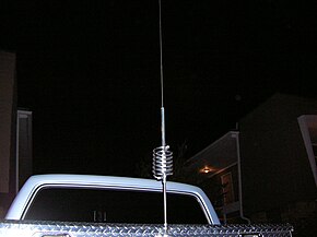 A typical mobile antenna with a center-placed loading coil CB antenna.jpg