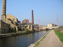 Mill buildings alongside the Leeds and Liverpool Canal in Shipley