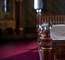 ... and the crystal detailing of her bed