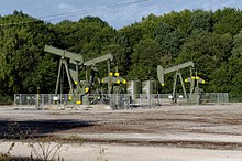 Pumpjack at Sivry-Courtry in Seine-et-Marne in 2013. Chevalets de pompage (pumpjack) - Puit de petrole a Sivry-Courtry - panoramio.jpg