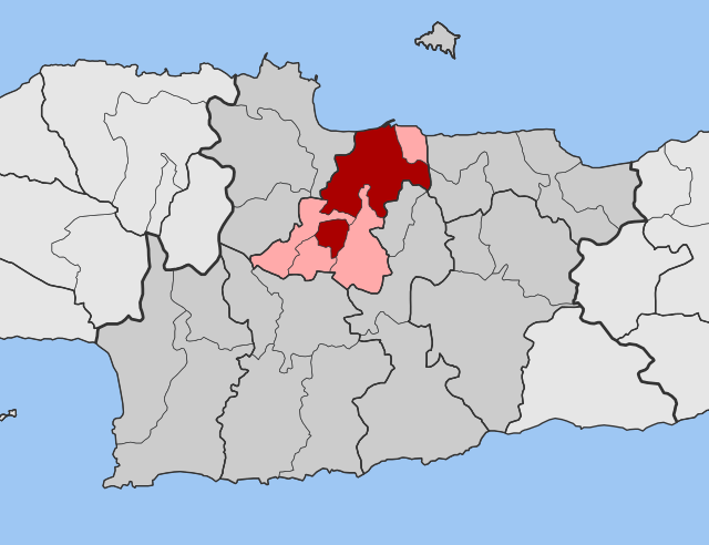 Localização da unidade municipal de Heraclião (vermelho) no município homónimo (rosa) e na unidade regional homónima