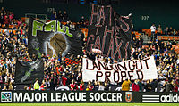 La Barra Brava display a tifo referencing the 2011 film Paul during a match against the L.A. Galaxy