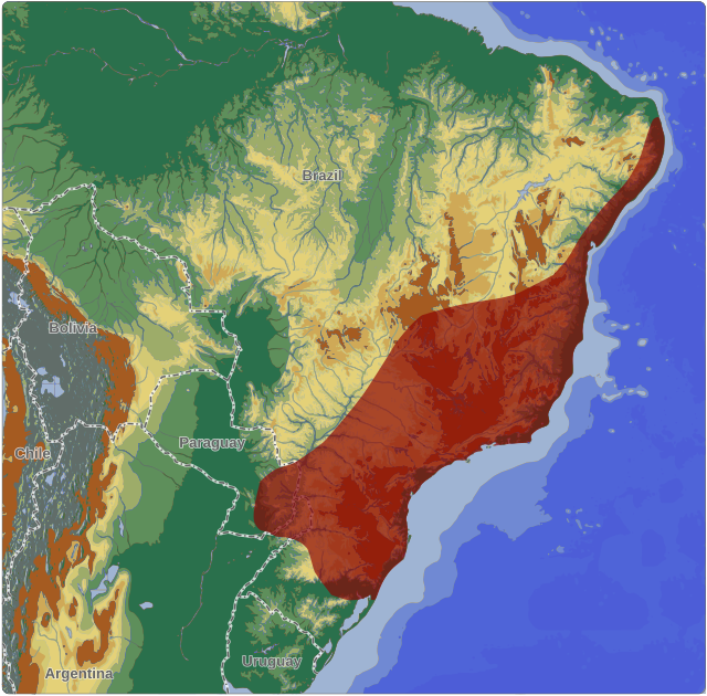 Sua distribuição está compreendida pela área em vermelho.