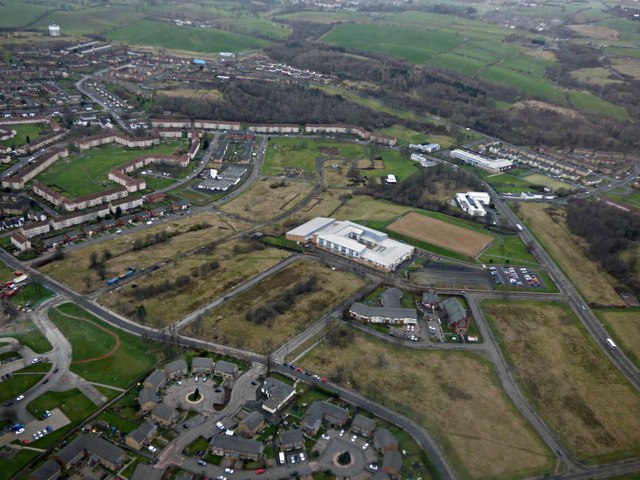 Aerial view of central Drumchapel (2017), with the local secondary school surrounded by expanses of unused land following the demolition of substandar