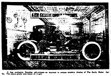 Window display and interior of the Early Motor Car Co., 1911 Early Motor Car Co. shop.jpg