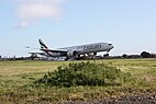 Emirates Boeing 777-200ER (A6-EML) landing at Glasgow International Airport.