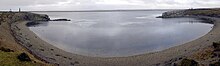 A panorama at Fitzroy showing the two memorials to those lost when the RFA ships Sir Galahad and Sir Tristam were attacked during the Falklands Conflict Fitzroy panorama - two memorials.jpg