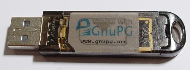 Gemalto usb shell token with a punched OpenPGP card inside.jpg