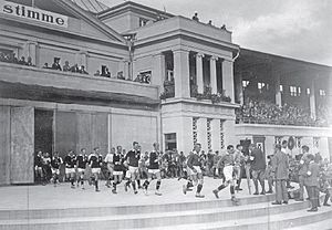 The teams of Germany and Finland entering the field before the final of the 1925 Workers' Summer Olympiad in Frankfurt. Germany Finland 1925.jpg