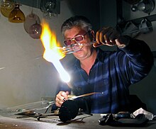 A glass blower holding a demonstration at the Glassworks Museum at Pentecost in 2009