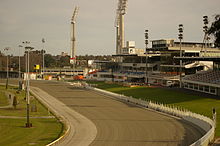 Grandstands, track and finish line. The floodlights surrounding the WACA Ground are visible in the background. Gloucester park int gnangarra 02.JPG