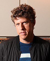 Greg Kurstin (pictured) co-produced four tracks for Electra Heart, one of which was "Power & Control". Greg Kurstin studio 7053 Peter Hill (cropped).jpg