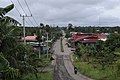 Bahasa Indonesia: Jalan poros desa Aji Kuning yang juga termasuk jalan poros lingkar pulau Sebatik, Kalimantan Utara.