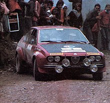 Jean-Claude Andruet and co-driver Yves Jouanny on an Alfa Romeo Alfetta GT (Group 2) at the 1975 Rally of San Martino di Castrozza. Jean-Claude Andruet - Alfa Romeo Alfetta GT (1975 Rallye San Martino di Castrozza) (cropped).jpg