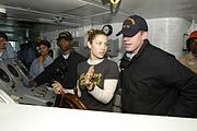 Biel receives instructions on the ship's helm from Seaman Redding aboard USS Abraham Lincoln (18 June 2004)