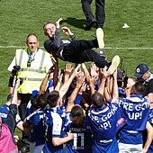 McKenna is thrown into the air by his Ipswich Town players after promotion to the Premier League in 2024 Kieran McKenna 3.jpg