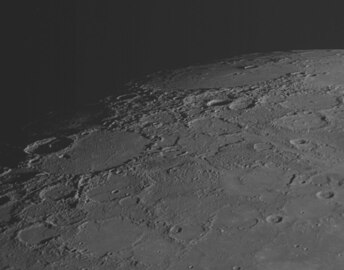 Oblique view of Mendelssohn and Kofi craters from MESSENGER's first flyby in January 2008