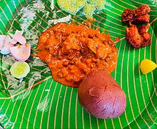 Typical Mandya style of ragi mudde, boti gojju Mandya style of non-veg food.jpg