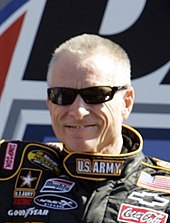 Mark Martin (pictured in 2007) became the oldest pole sitter in Daytona 500 history at 51 years old at 27 days by posting the fastest lap in qualifying. Mark Martin 2007 Daytona 500 (cropped).jpg