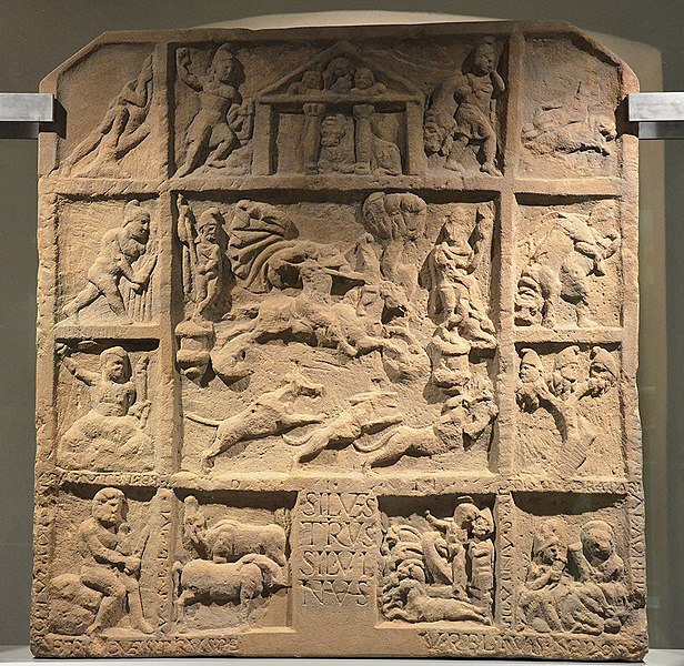 File:Mithras the hunter represented on horseback galloping to the right and shooting arrows, two-sided relief on pivot with side-panels, Museum Schloss Fechenbach, Dieburg, Germany (9352360418).jpg