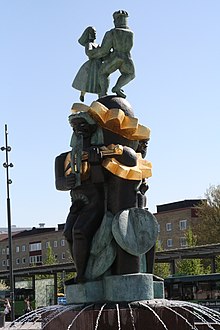 Скульптуры некков на фонтане в городе Уппсала
