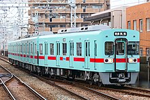 西鉄天神大牟田線の大橋駅へ進入する西鉄6050形電車