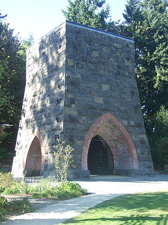 Restored remains of the 1866 Oregon Iron Company furnace, in George Rogers Park