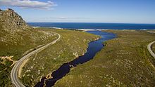 An aerial photograph of the mouth of the Palmiet River as it flows into the Atlantic Ocean. Palmiet River Mouth (1 of 1).jpg