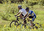 President George Bush and 2005 Tour de France winner Lance Armstrong take a ride together