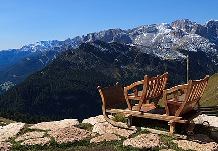 Sleigh at the Rifugio Friedrich August, in the background the Duron Valley, Trentino, Italy.