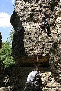 A climber and a belayer using a climbing rope Rock Climbing Mississippi Palisades.jpg