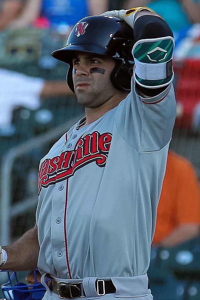 A baseball player in gray