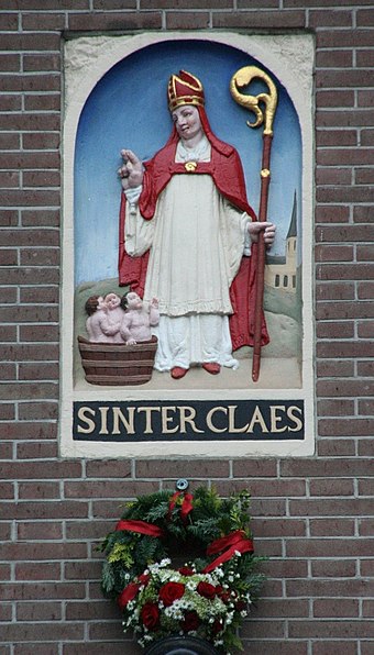 Sinter Claes depiction at a 16th-century house near the Dam in Amsterdam. Saint Nicholas is the patron saint of the capital of the Netherlands