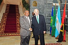 Angolan Foreign Minister Georges Rebelo Chikoti and Argentine Foreign Minister Hector Timerman in Luanda; March 2012. Timerman-Angola (6955750359).jpg