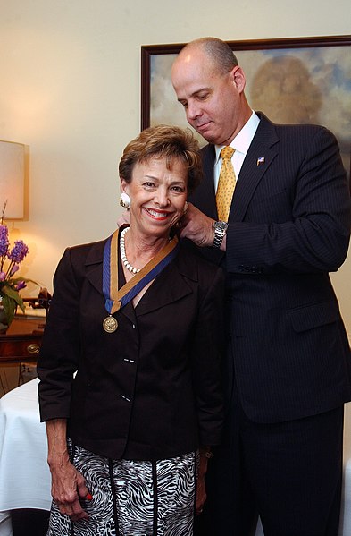 File:US Navy 050726-N-2568S-001 Under Secretary of the Navy, the Honorable Dino Aviles presents the Meritorious Public Service Award to Mrs. Margaret Dalton in a ceremony held at the Pentagon.jpg