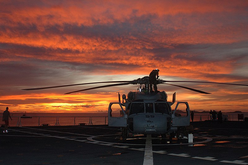 File:US Navy 060606-N-9076B-162 Crew members assigned to Helicopter Sea Combat Squadron Two Five (HSC-25), perform scheduled maintenance during a break from flight quarters.jpg