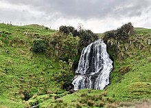 Waiteti Stream waterfall, beside the line, about 2km north of Puketutu