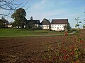 Side building (with upper arbor) and barn of a four-sided courtyard plus a field barn directly at the homestead