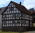 English: Half-timbered building (former mill) in Wartenberg, Landenhausen, An der Erlenmuehle 7, Hesse, Germany.