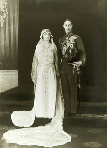 Elizabeth and her husband Albert on their wedding day, 26 April 1923 Wedding of George VI and Elizabeth Bowes-Lyon.png